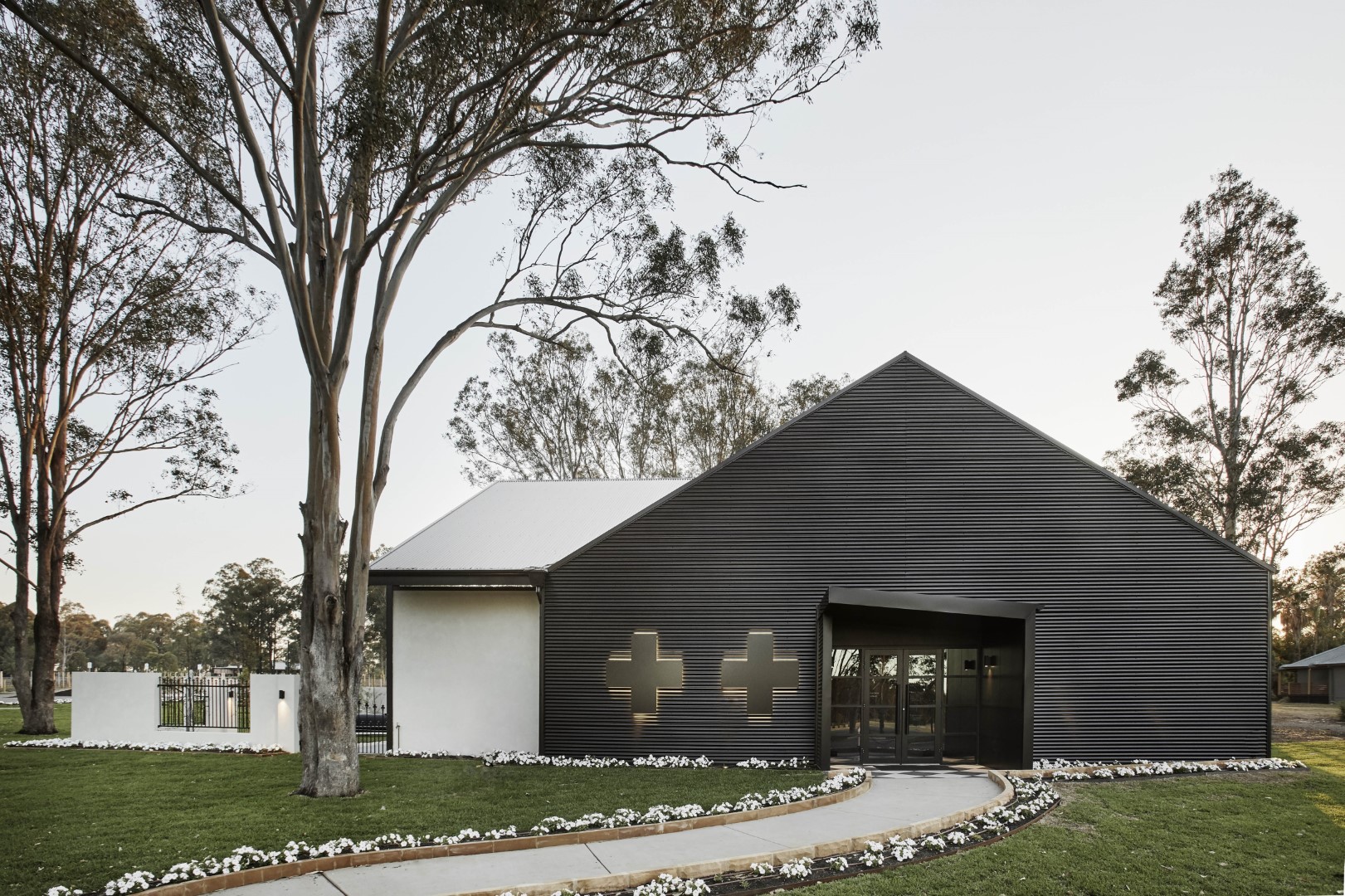 Vamp by Lisa McGuigan Cellar door clad in Lysaght WALLCLAD® in COLORBOND® steel Night Sky®