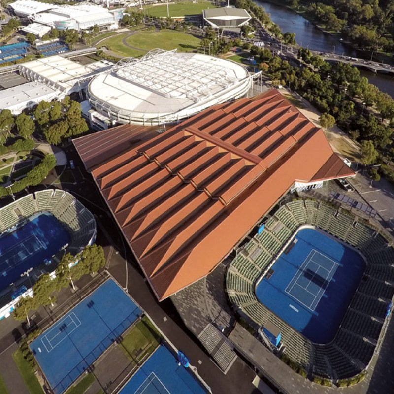 A deferential roof-line below that of Rod Laver Arena preserves the iconic form of the old