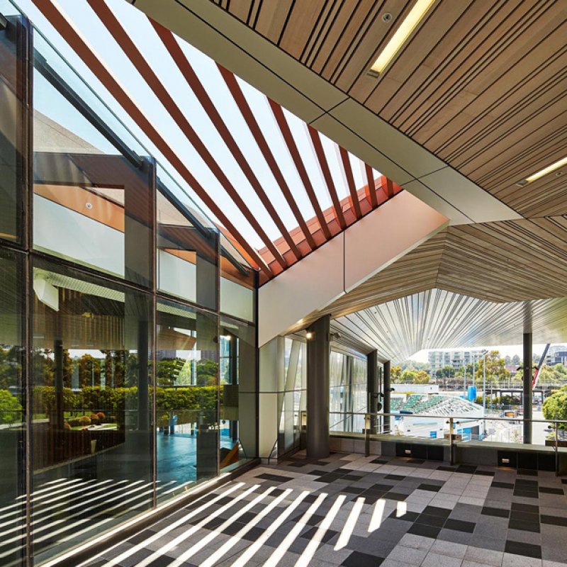 The lowered roofline and ceiling are balanced by an active use of skylights and materials to maintain spatial generosity and daylight connection