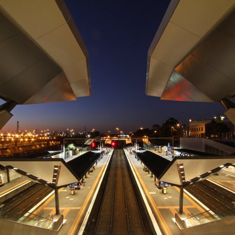 Lightweight, slender steelwork flows across the site as a sequence of platforms for viewing, arrival and departure. Parasol roofs and sharp functionality deliver a signature of scale and fully human spaces